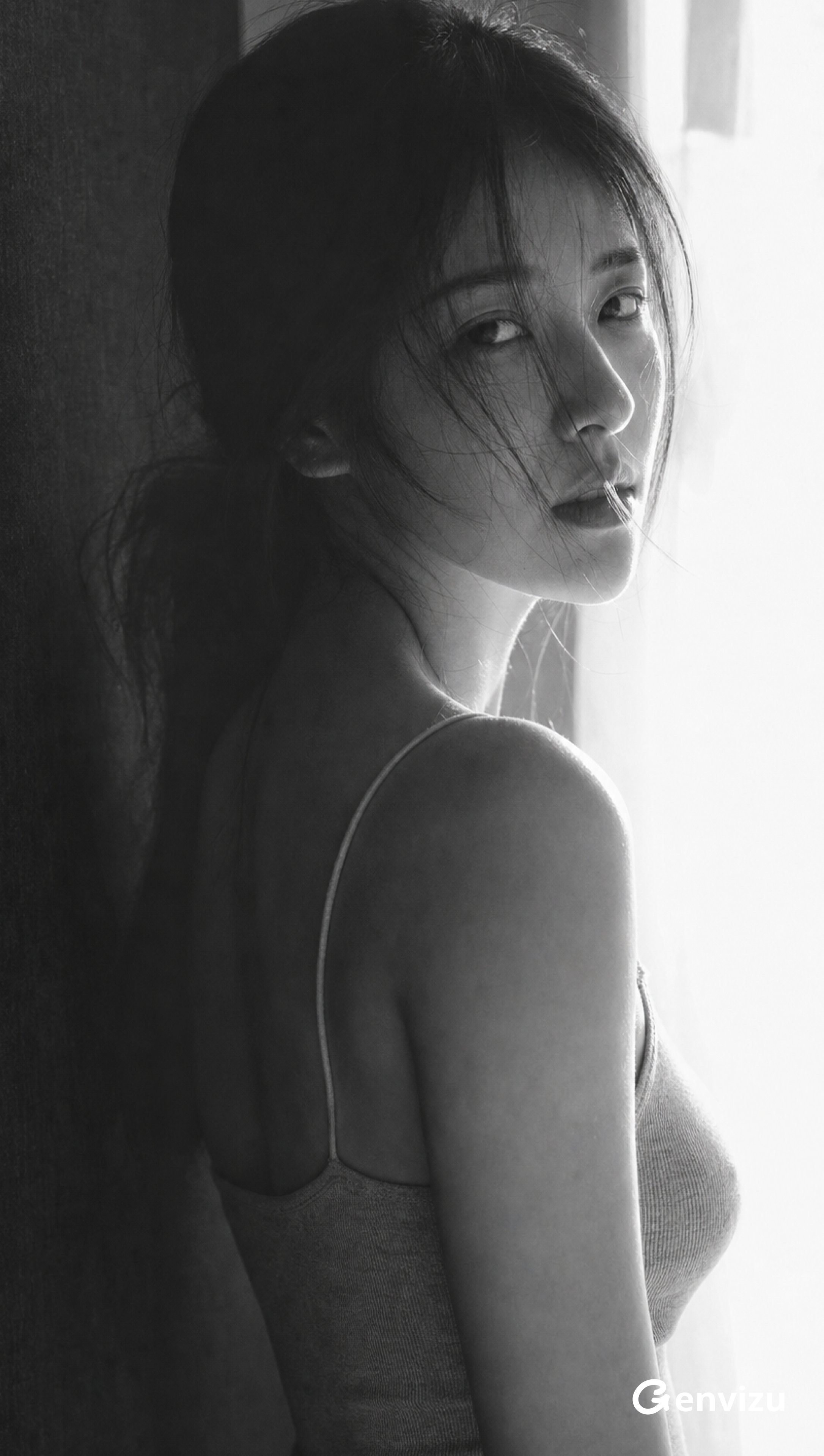 Tall narrow vertical black-and-white artistic portrait photography