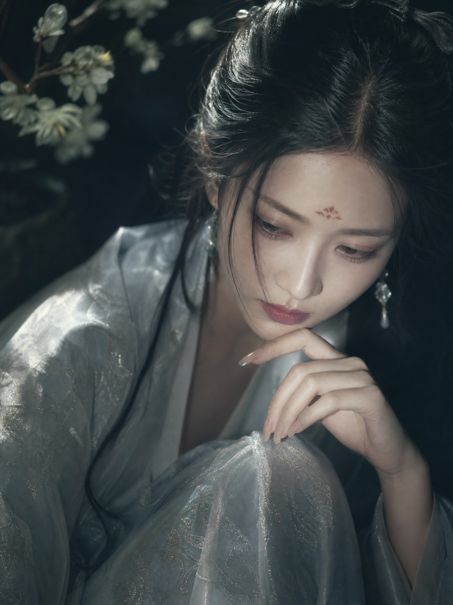Chinese-style realistic portrait photography. Classical soft-focus cinematic aesthetics, cool and melancholic atmosphere. Close-up slight high-angle view...