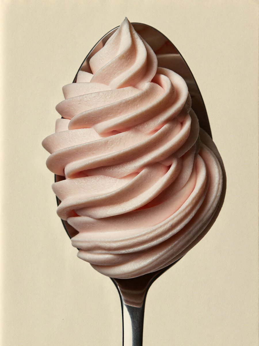 Pink Soft Serve Ice Cream on a Spoon